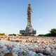 A rocket road will carry the rocket and spacecraft (in background) to the launchpad.